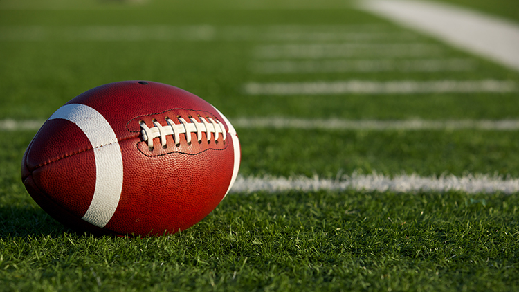 American Football on the Field near the hashmarks or yard lines