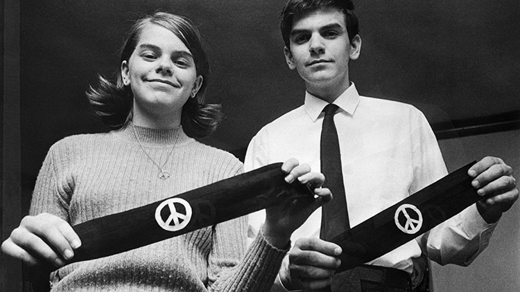 Mary Beth and John Tinker display their black peace armbands.